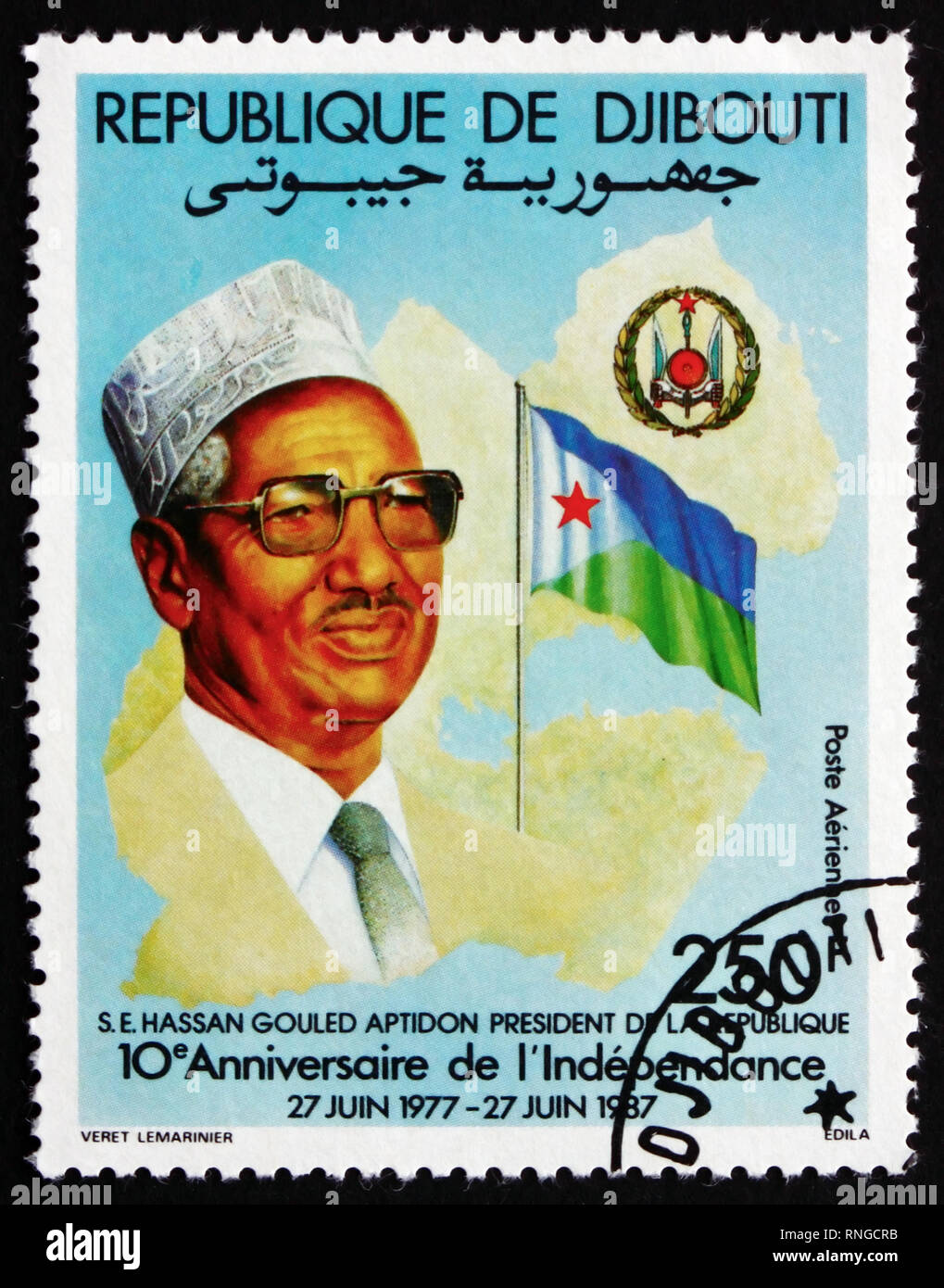 DJIBOUTI - CIRCA 1987: a stamp printed in the Djibouti shows President Hassan Gouled Aptidon, National Crest and Flag, 10th Anniversary of the Nationa Stock Photo