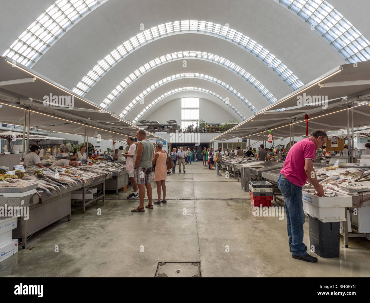 Modern clean light and airy Matosinhos municipal indoor market with a domed curved see-through glass roof near Porto in Portugal Stock Photo