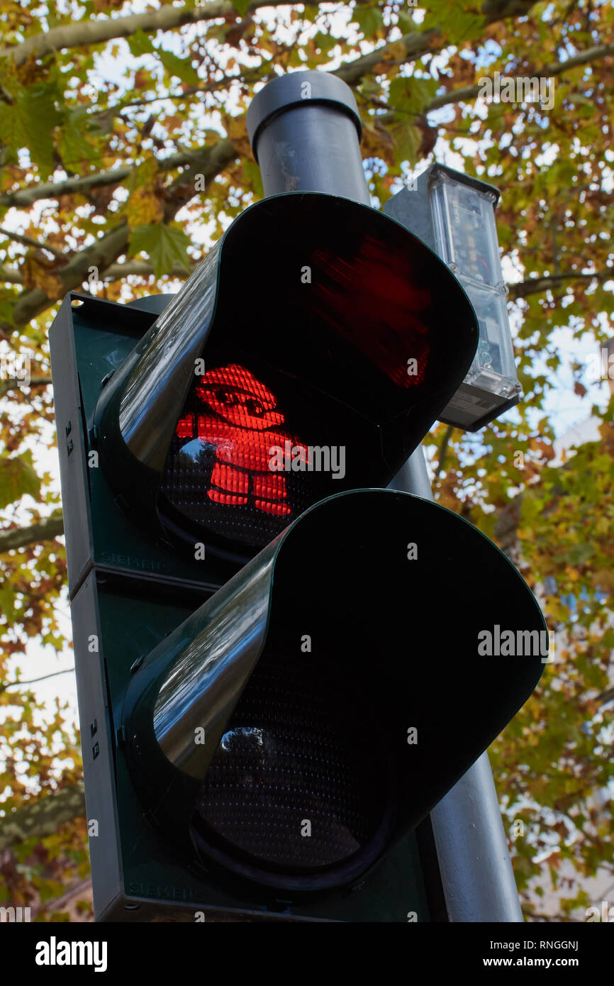 Mainz, Germany, October 27- 2017: Traffic light figure 'Mainzelmaennchen' was specially designed for the city of Mainz. Stock Photo