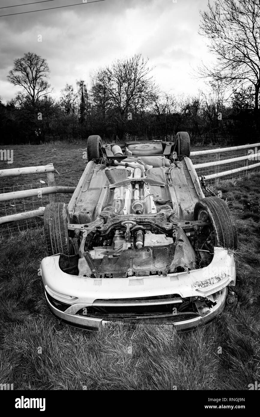 Car Crash and Car Damage. Vehicle in a field after high speed crash