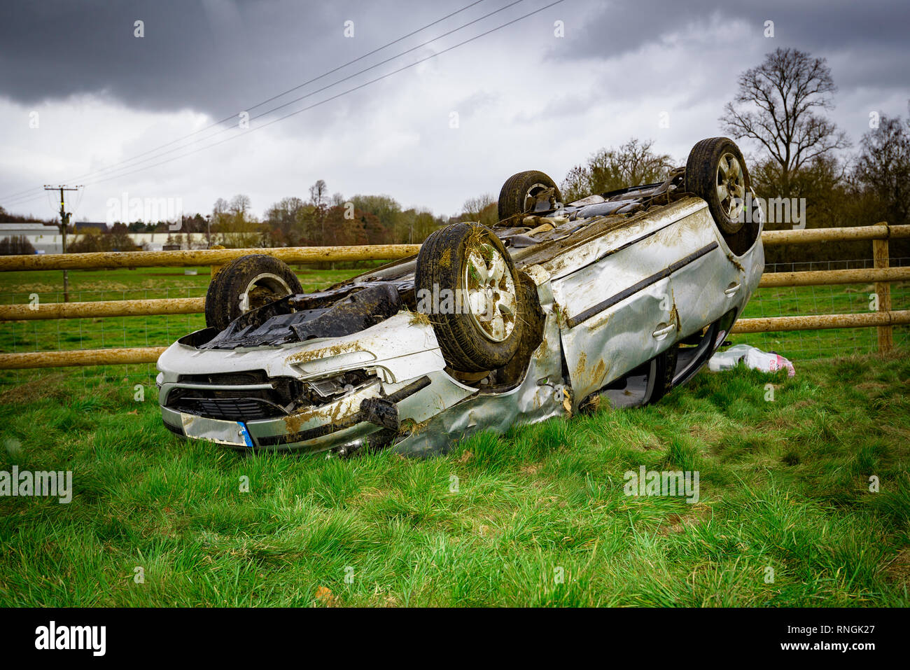Car Crash and Car Damage. Vehicle rolled over in a field after a high