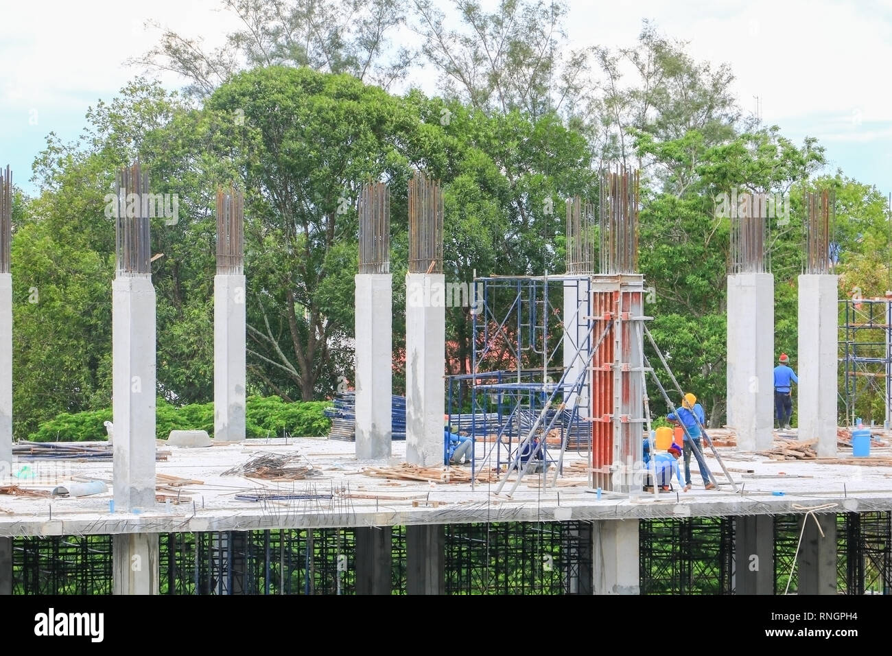 construction laborer team working on high ground building housing in ...