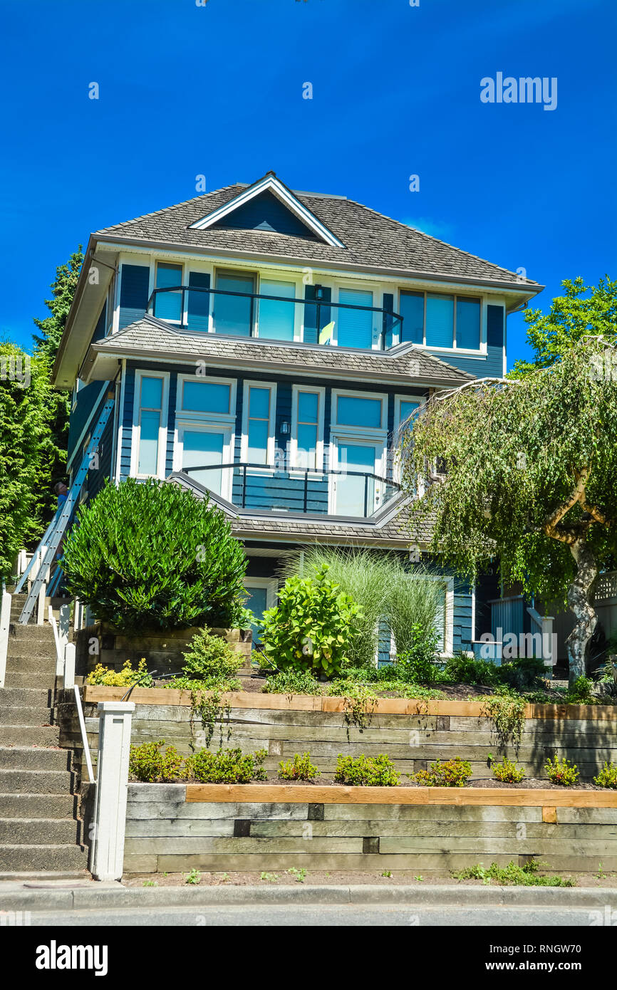 Residential house built up on land terrace in Vancouver, British Columbia. Stock Photo