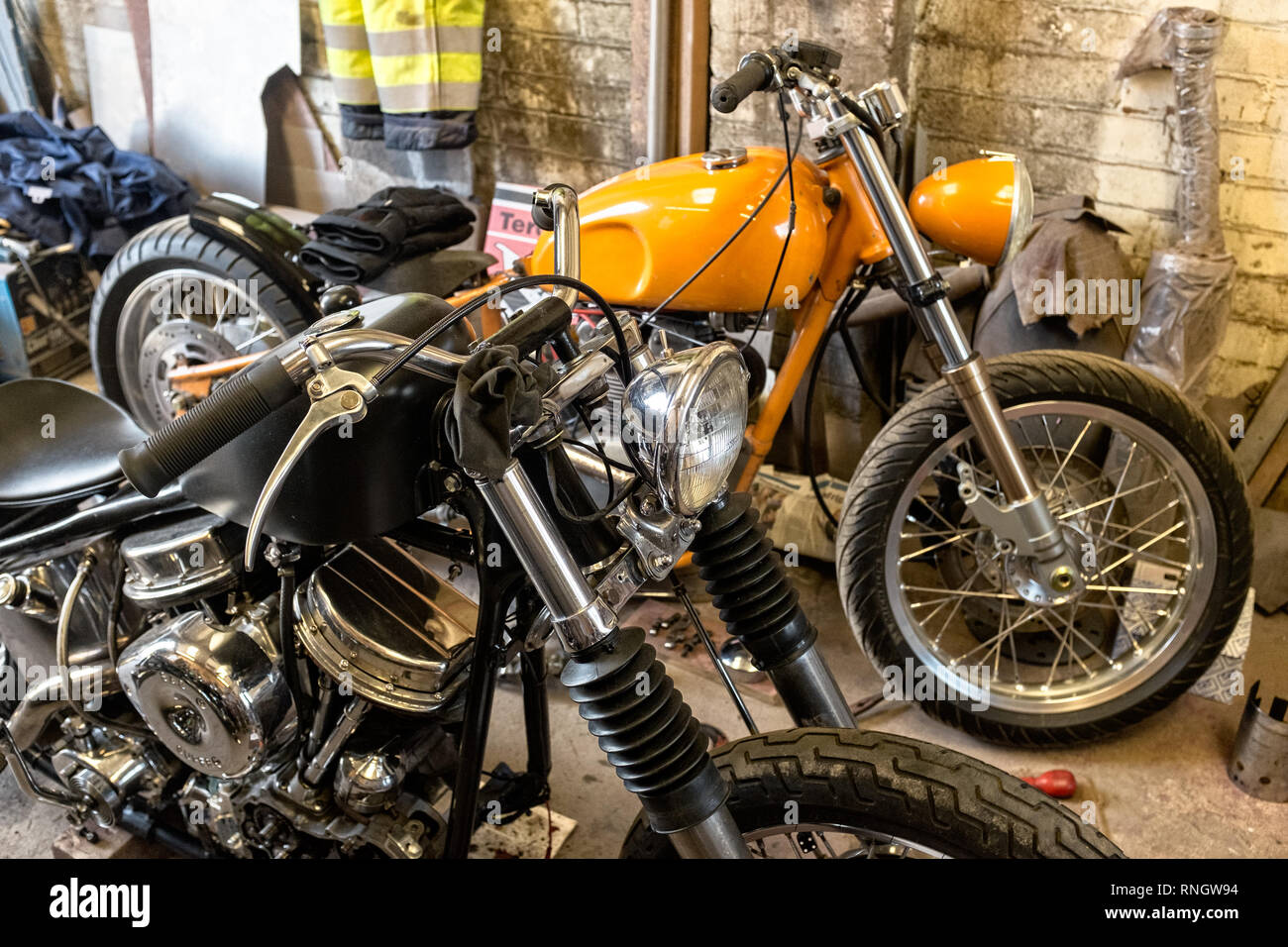 Interior view of local motorcycle workshop garage full of various