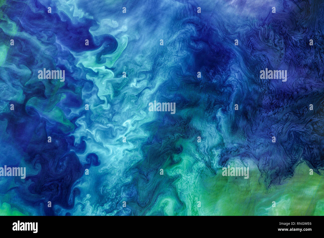 Alaskan coast usually come alive each spring with blooms of phytoplankton. These blooms can form striking patterns of blue and green seawater, such as Stock Photo