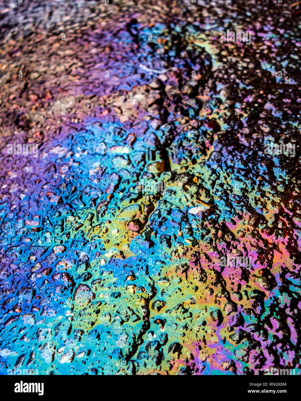 Gasoline Petrol Oil Spill Rainbow on Tarmac Road Stock Photo Alamy