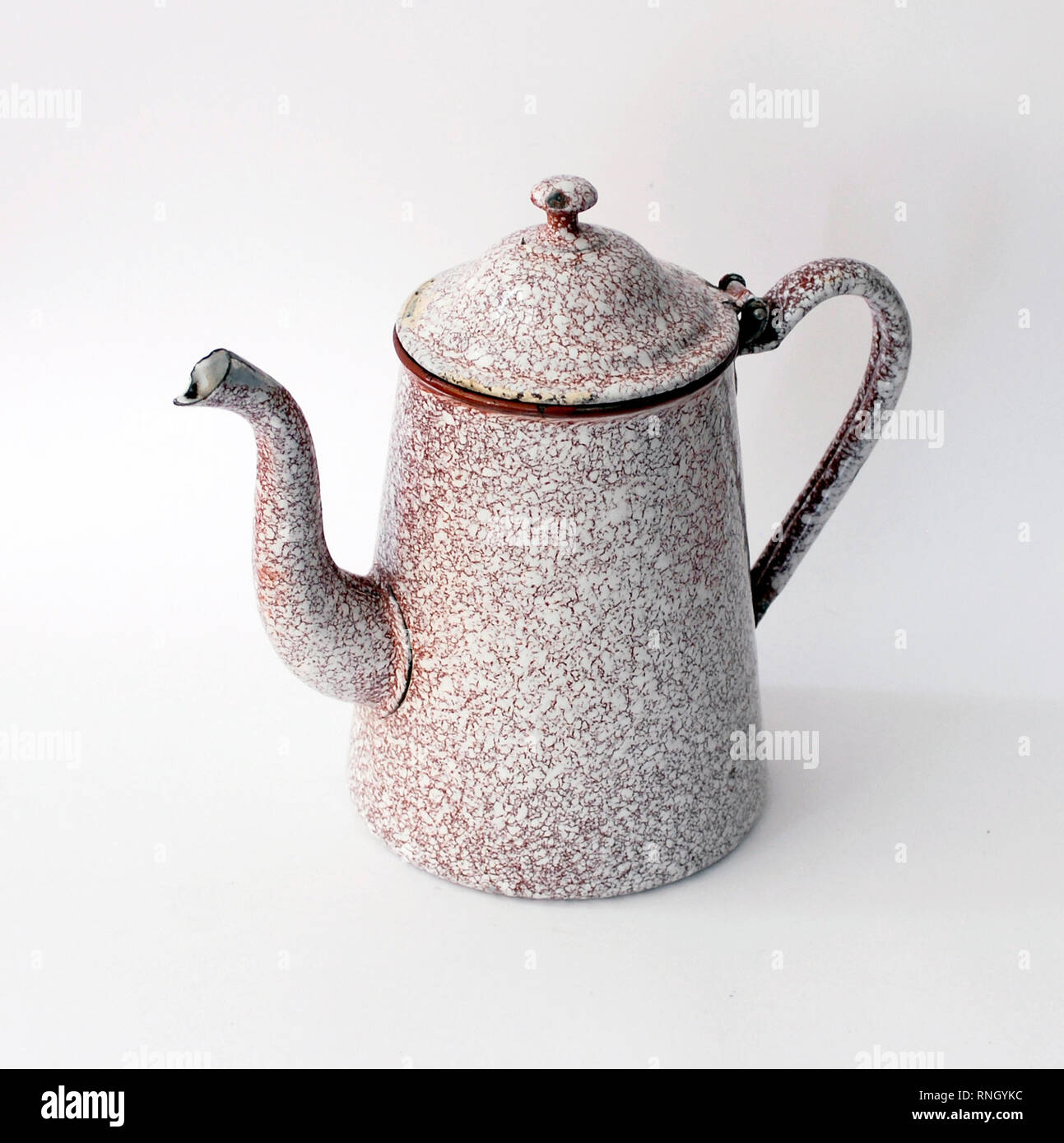 Vintage enameled metal teapot for kitchen Stock Photo