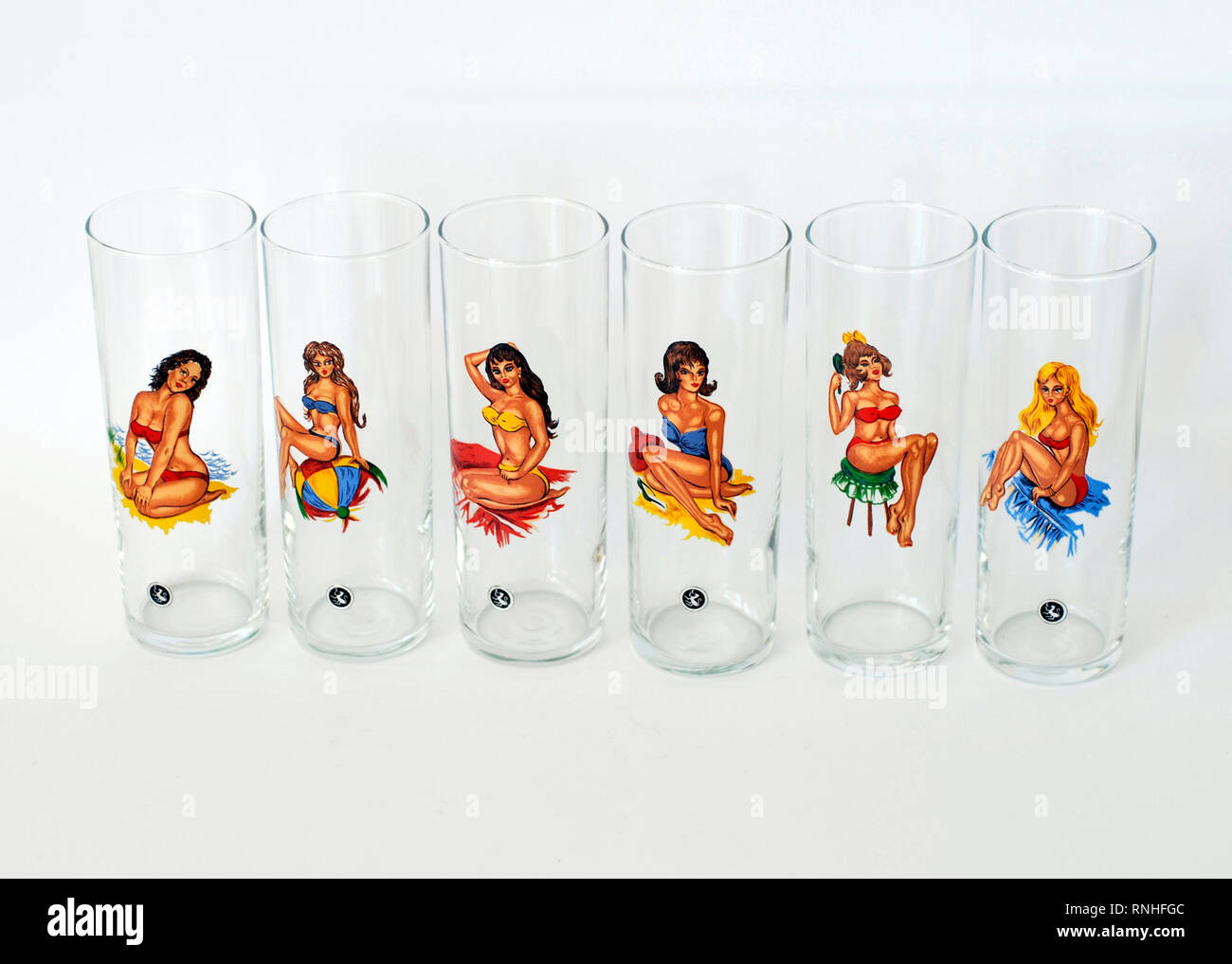 Tube glasses with drawings of women in bikini. Vitro brand. Originals, 70s Stock Photo