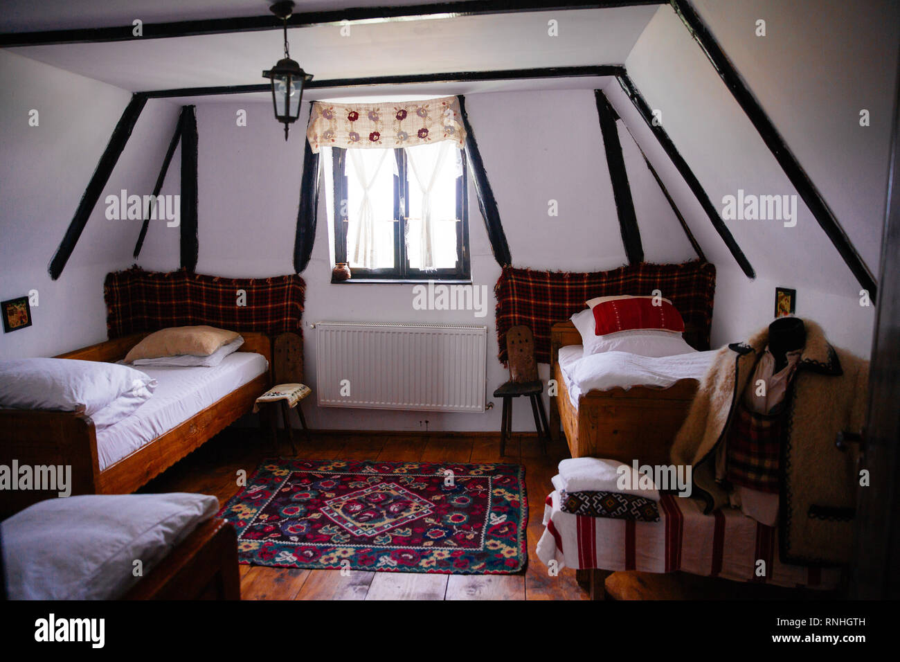 In the small village of Breb, Maramureș region of northern Transylvania are a group of 100 year old restored barns that are for rent Stock Photo