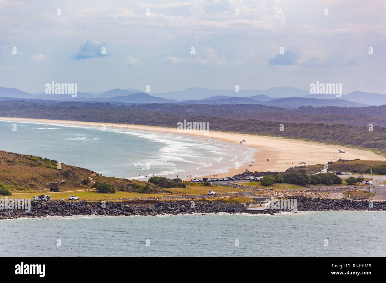 Cars driving on Gallows Beach at Coffs Harbour, New South Wales, Australia Stock Photo