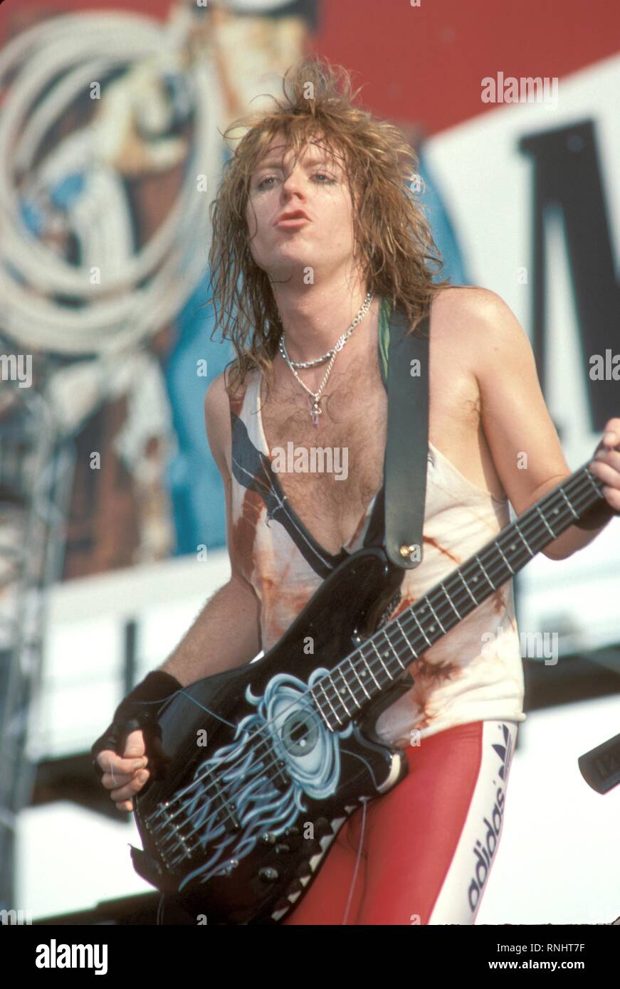 Bassist Jeff Pilson is shown performing on stage during a Dokken concert  Stock Photo - Alamy