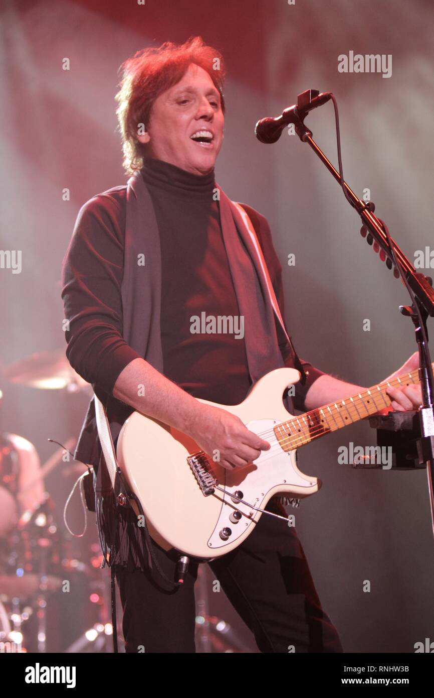 Doobie Brothers guitarist John McFee is shown performing during a 'live' concert appearance. Stock Photo