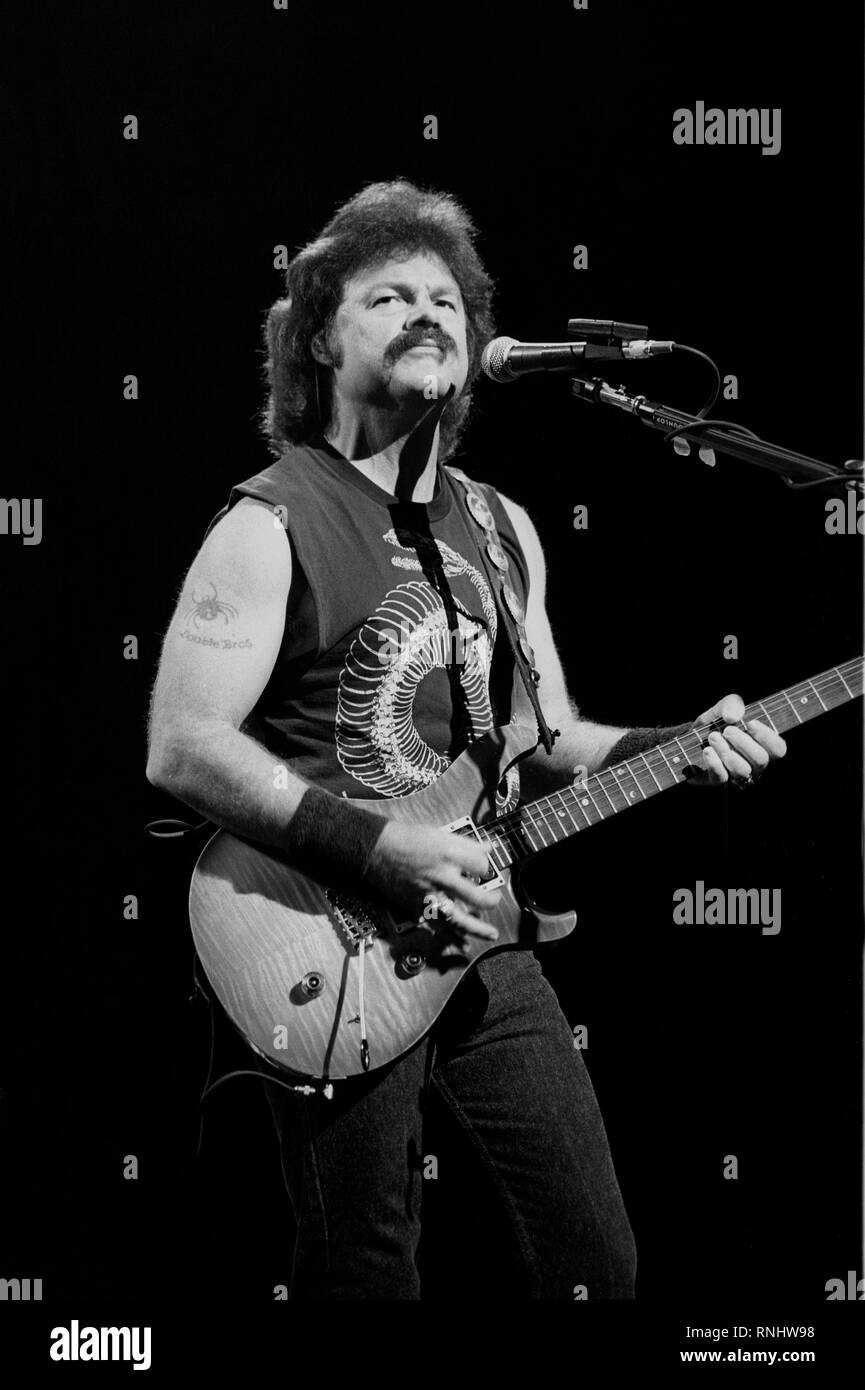 Doobie Brothers guitarist Tom Johnston is shown performing during a 'live' concert appearance. Stock Photo
