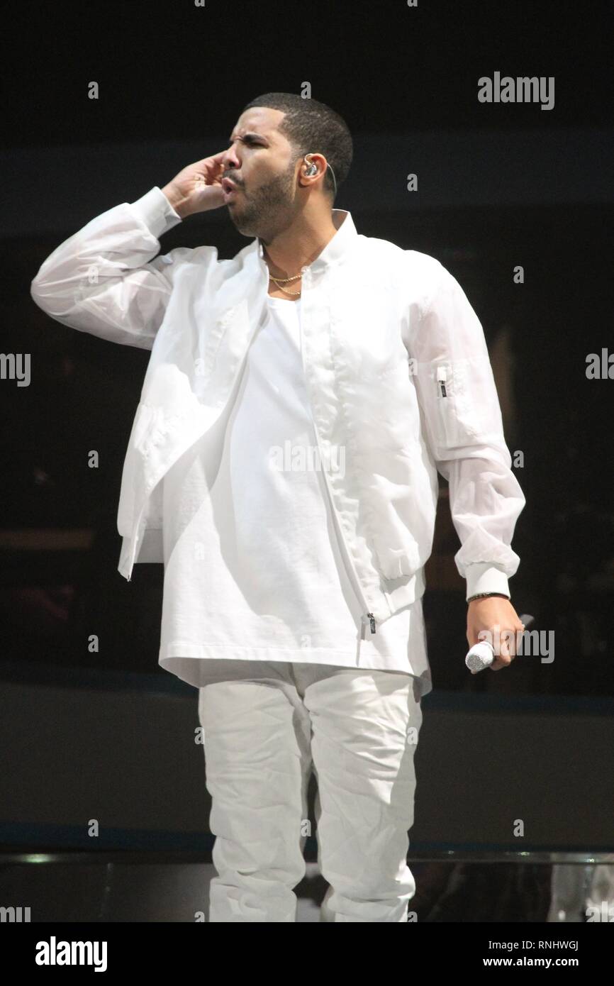 Singer and actor Aubrey Drake Graham, who records under the mononym Drake, is shown performing on stage during a 'live' concert appearance. Stock Photo