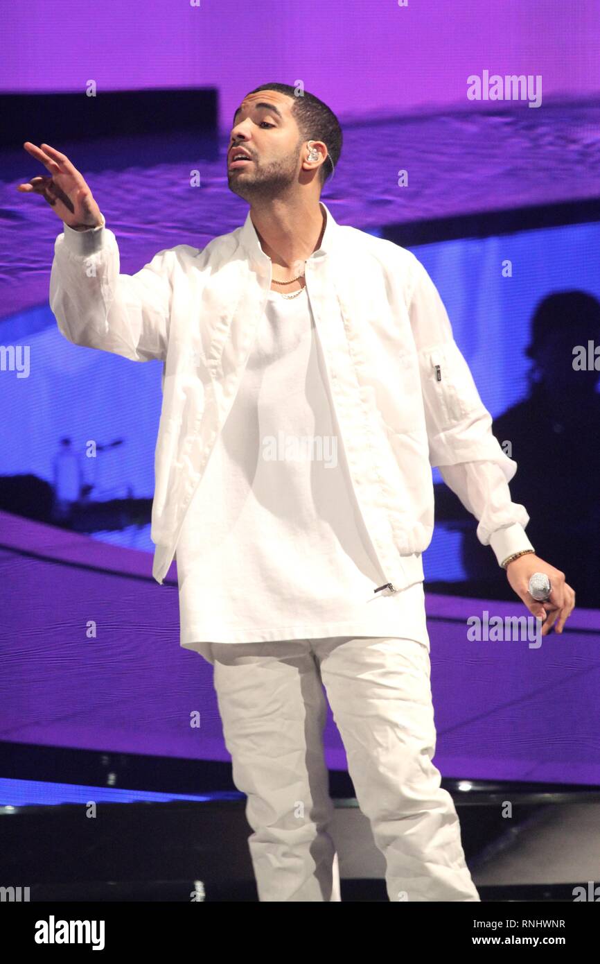 Singer and actor Aubrey Drake Graham, who records under the mononym Drake, is shown performing on stage during a 'live' concert appearance. Stock Photo