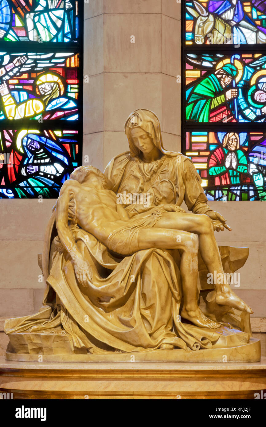A replica of the famous statue of La Pieta inside the Manila Cathedral, first built in 1571, todays church is the eighth structure with the others des Stock Photo