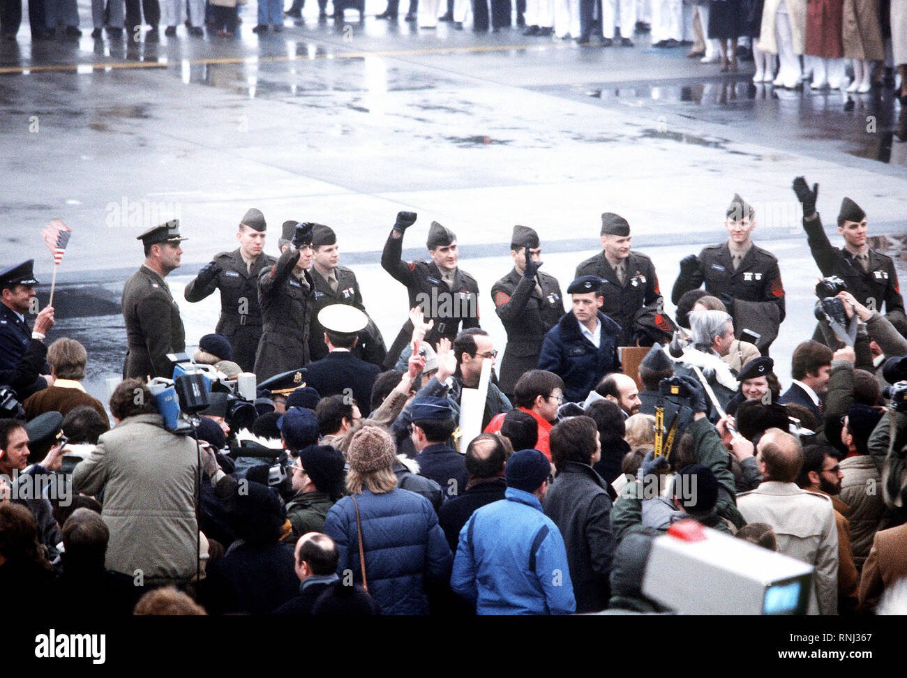 1981 - U.S. Marines, former hostages, arrive at the base for their departure to the United States. The 52 hostages were hospitalized for a few days after their release from Iran Stock Photo