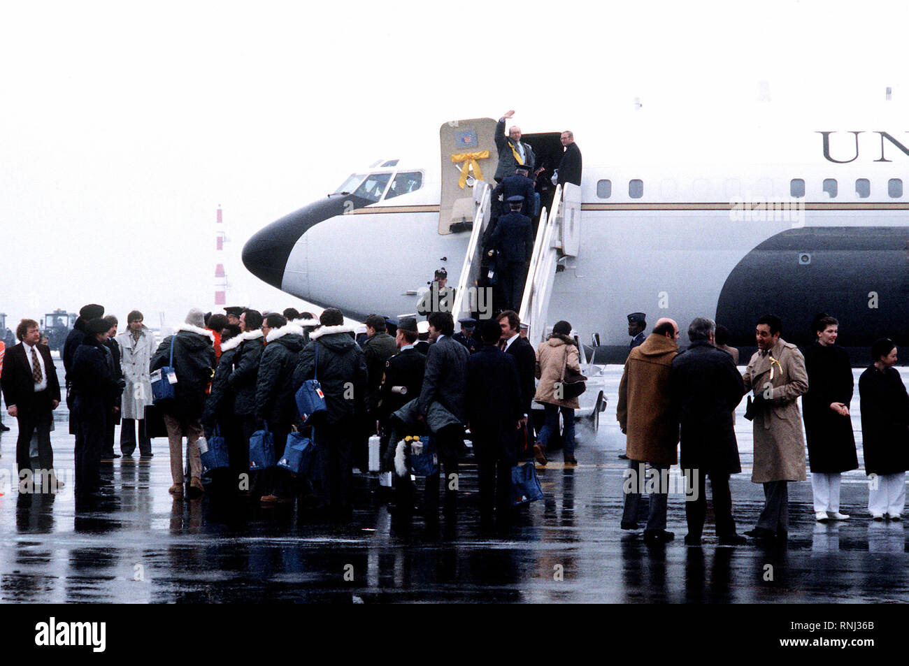 1981 - U.S. Marines, former hostages, arrive at the base for their departure to the United States.  The 52 hostages were hospitalized for a few days after their release from Iran. Stock Photo