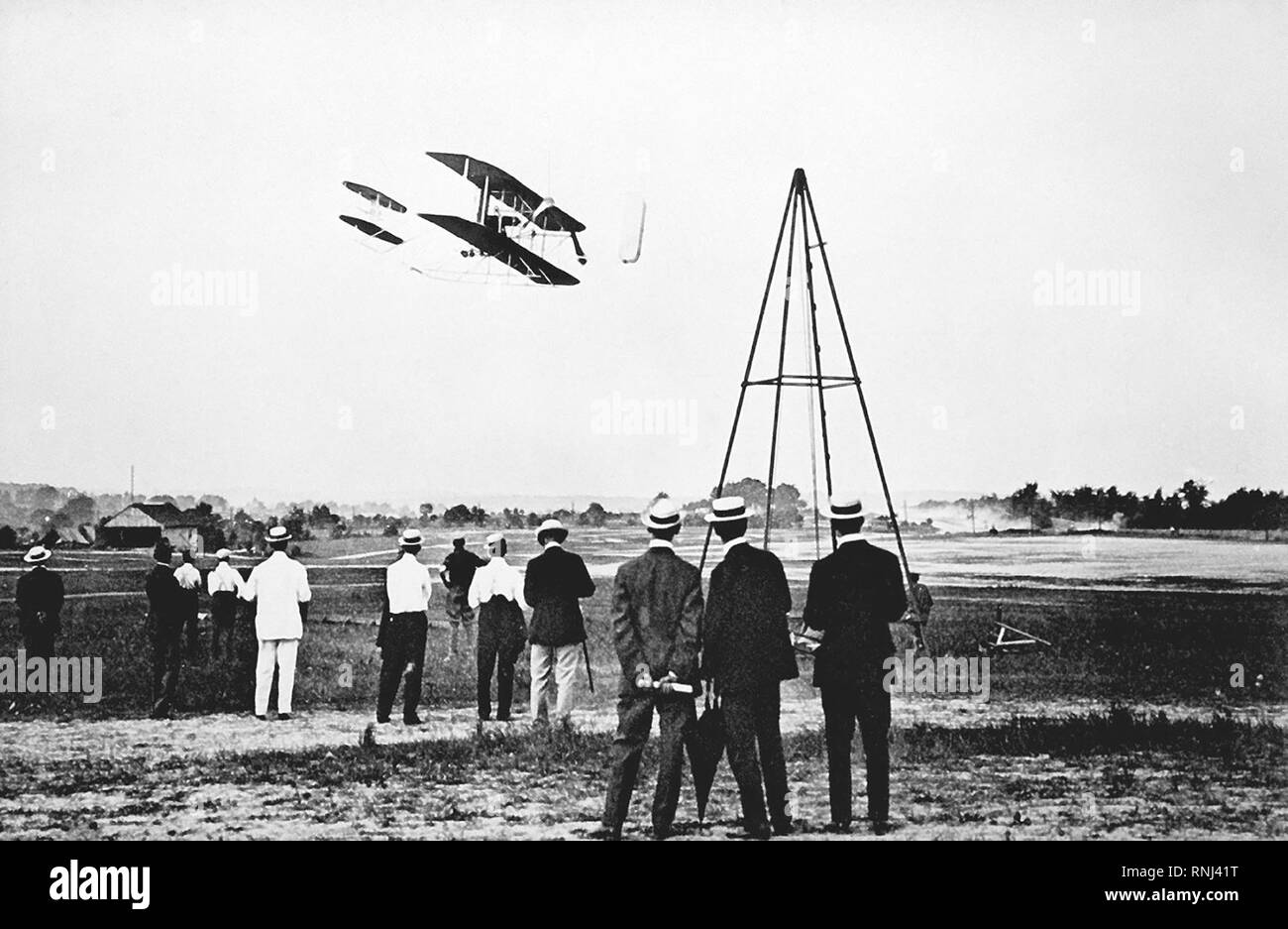 The Wright Brothers test fly their aircraft on Fort Myer's parade field. This series of test flights  resulted in the Army purchasing its first aircraft. In the first flight, Sept. 9, 1908, Orville Wright kept the plane aloft 71 seconds. The second flight resulted in a crash that left Wright severely cut and bruised and his passenger, Army Lt. Thomas Selfridge dead -- the first powered-aviation fatality. Stock Photo