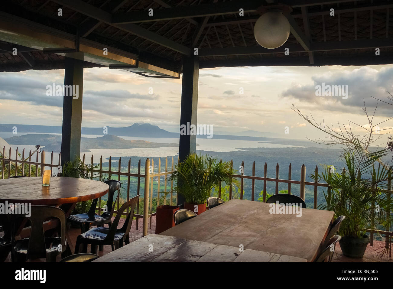 Taal Volcano Overlook With Tables and Chairs - Tagaytay, Philippines Stock Photo