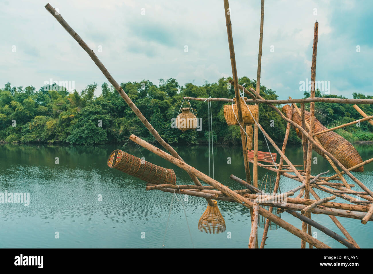 Ancient bamboo fish trap equipment of countryside, Thailand Stock Photo