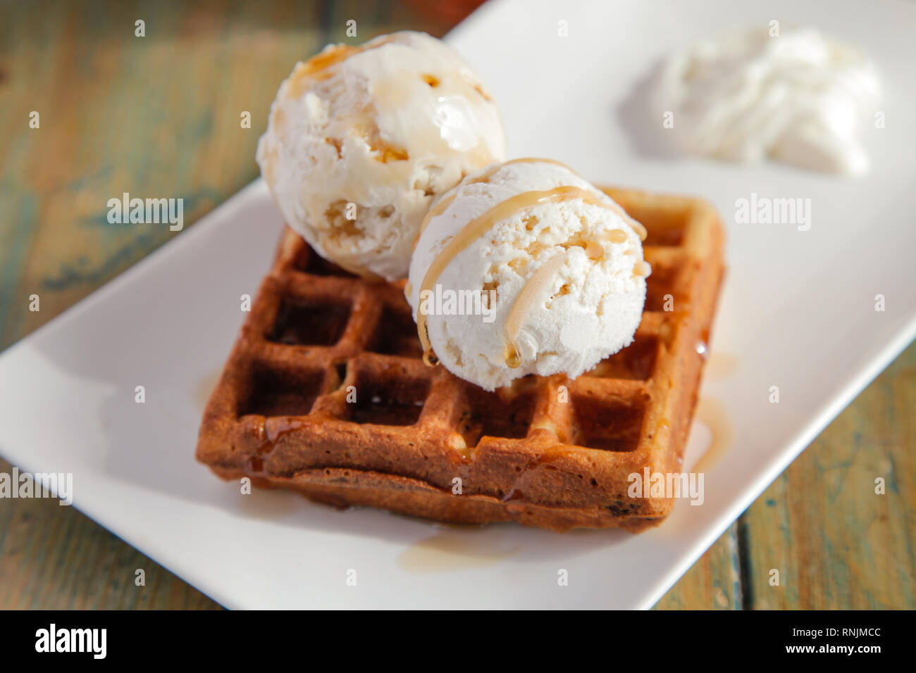 Vanilla ice cream with waffle Stock Photo Alamy