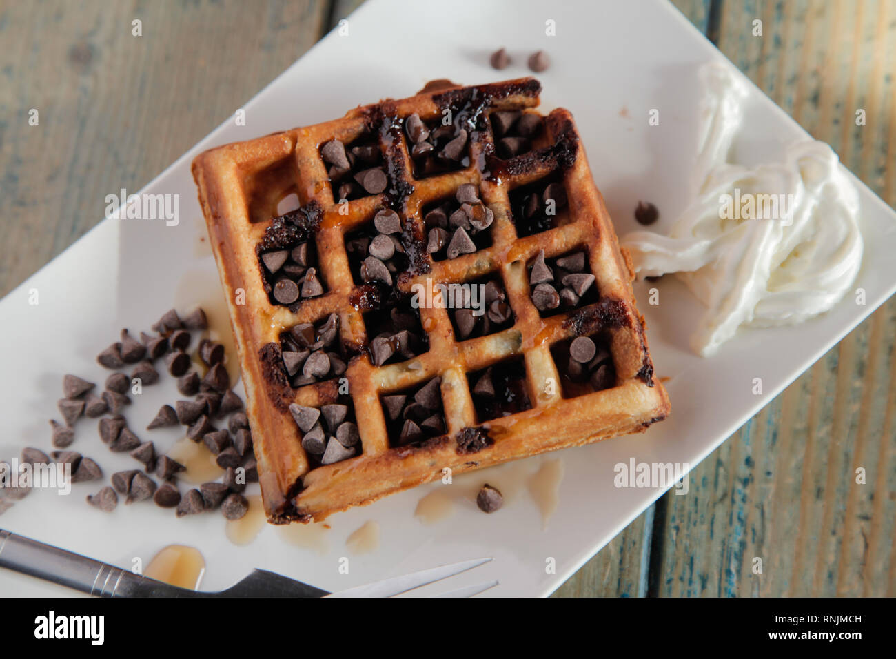 Chocolate Chip Waffle with whipped cream Stock Photo
