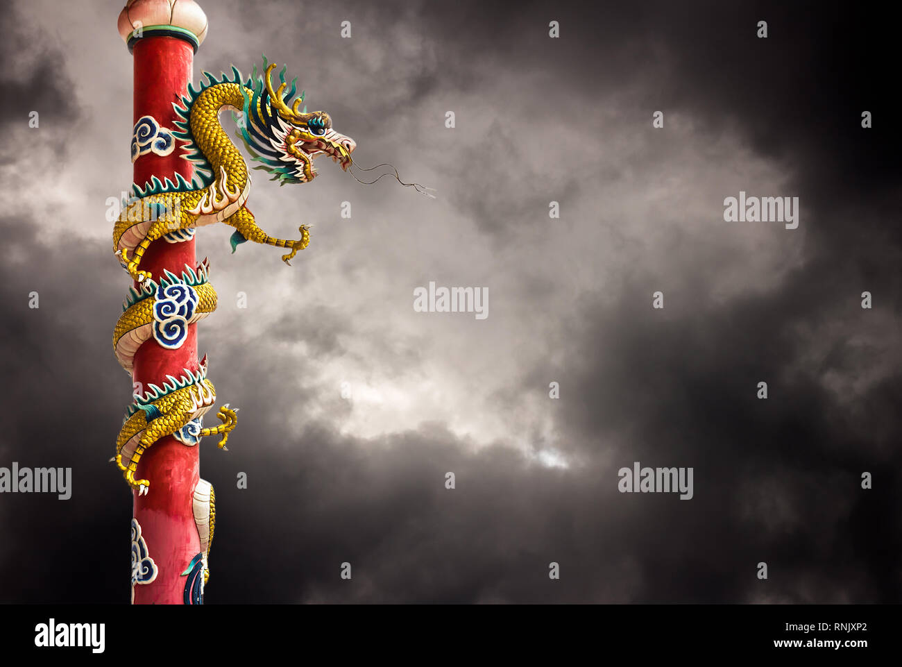 Dragon statue in the storm Stock Photo