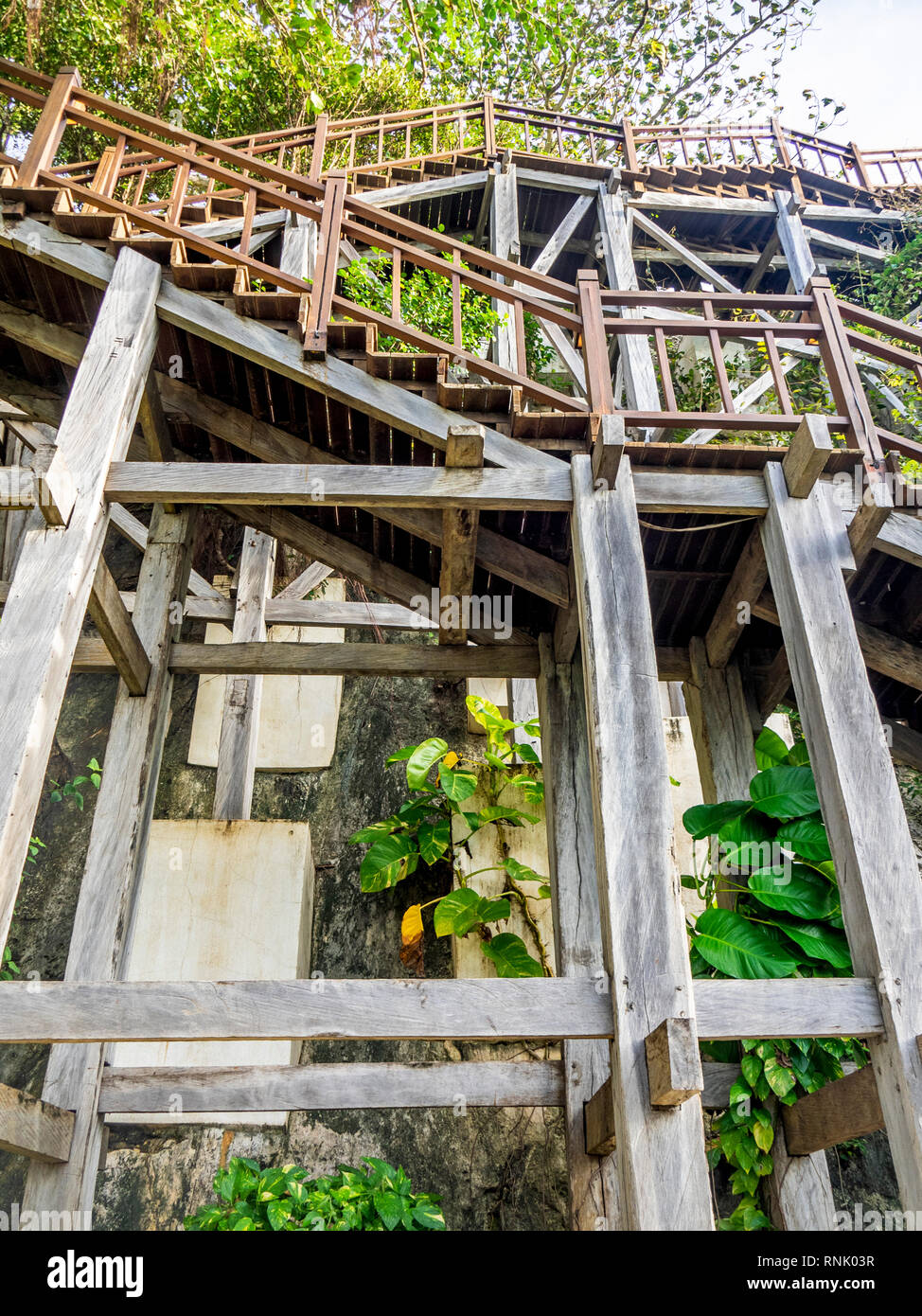 Wooden staircase to enter The Rock Bar at Ayana Resort and Spa Jimbaran Bali Indonesia. Stock Photo