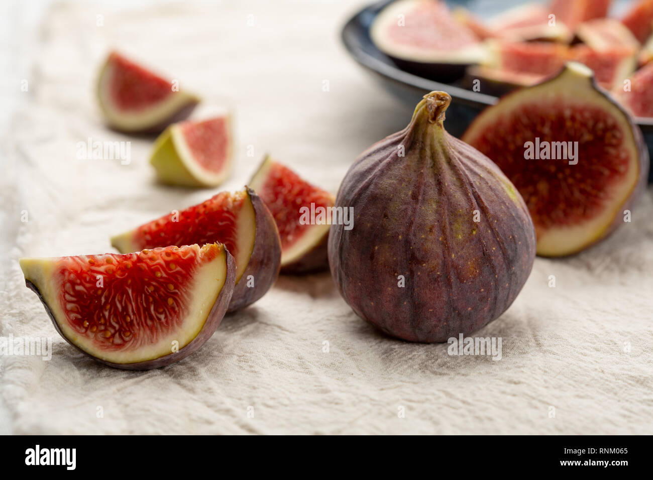 3 Ripe Figs Ripe figs sliced and whole Stock Photo - Alamy