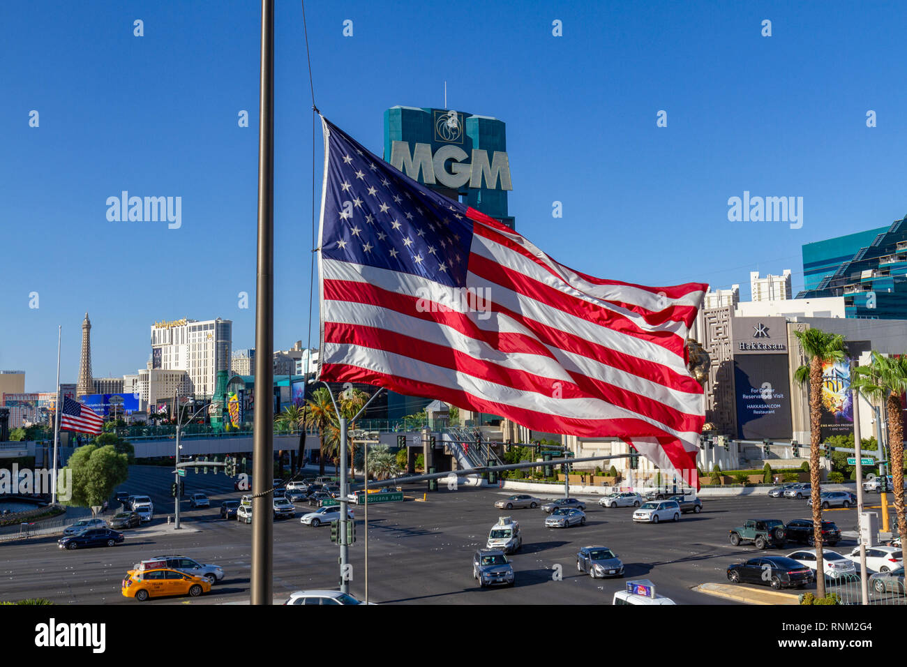 America flag with the MGM Grand Hotel, Las Vegas on The Strip in Las Vegas, Nevada, United States. Stock Photo