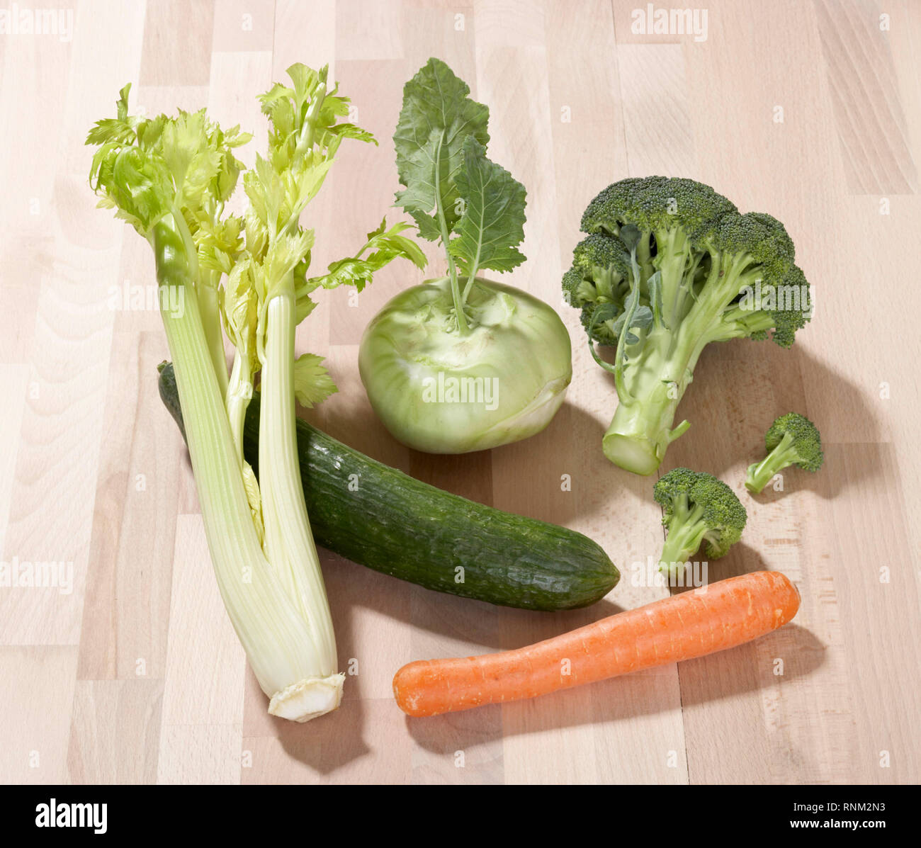 Vegetables: Greenspouting Broccoli, Cucumber, Carrot , Kohlrabi, German Turnip, Stalk Celery. Stock Photo