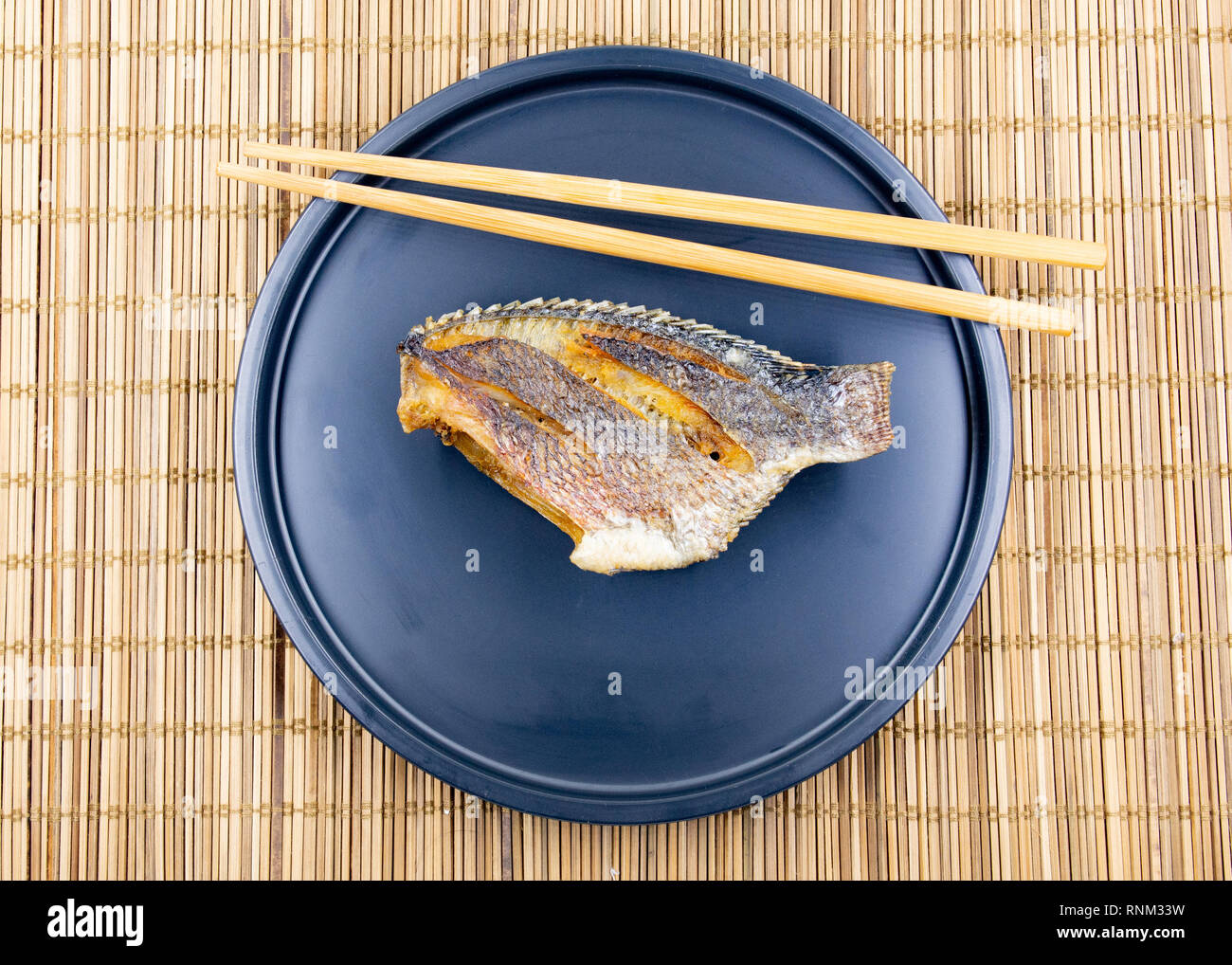 Tasty fried fish, Crispy Fried Fish Asian Style Stock Photo - Alamy