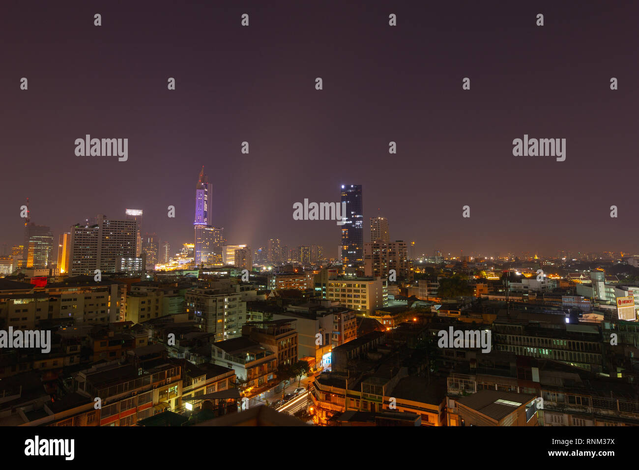 Bangkok downtown at night Stock Photo - Alamy