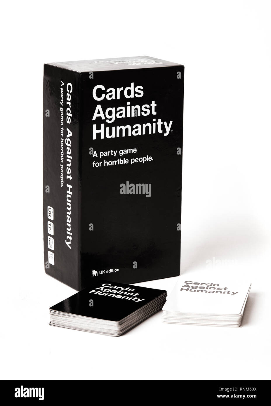 Cards against humanity boxed game with cards shown. Stock Photo