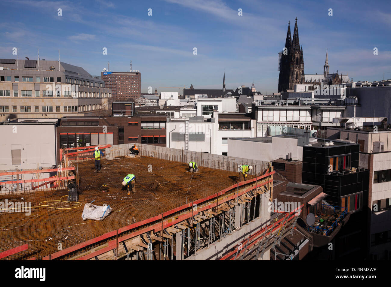 the construction site of the building project Antoniter Quartier on the street Schildergasse in the city, in the background the cathedral, Cologne, Ge Stock Photo