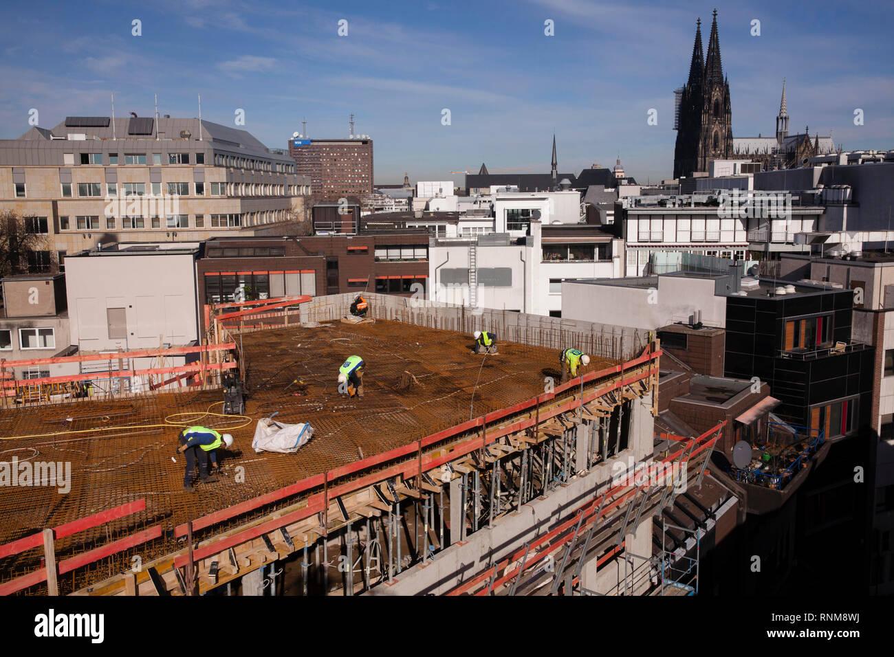 the construction site of the building project Antoniter Quartier on the street Schildergasse in the city, in the background the cathedral, Cologne, Ge Stock Photo