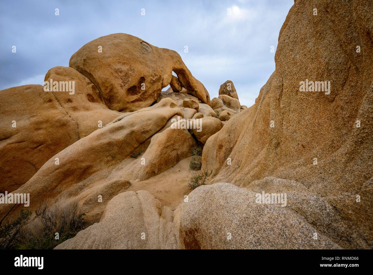 Rock formations, rear left Arch Rock, rock arch, monzogranite formation, Arch Rock Nature Trail, White Tank Campground Stock Photo