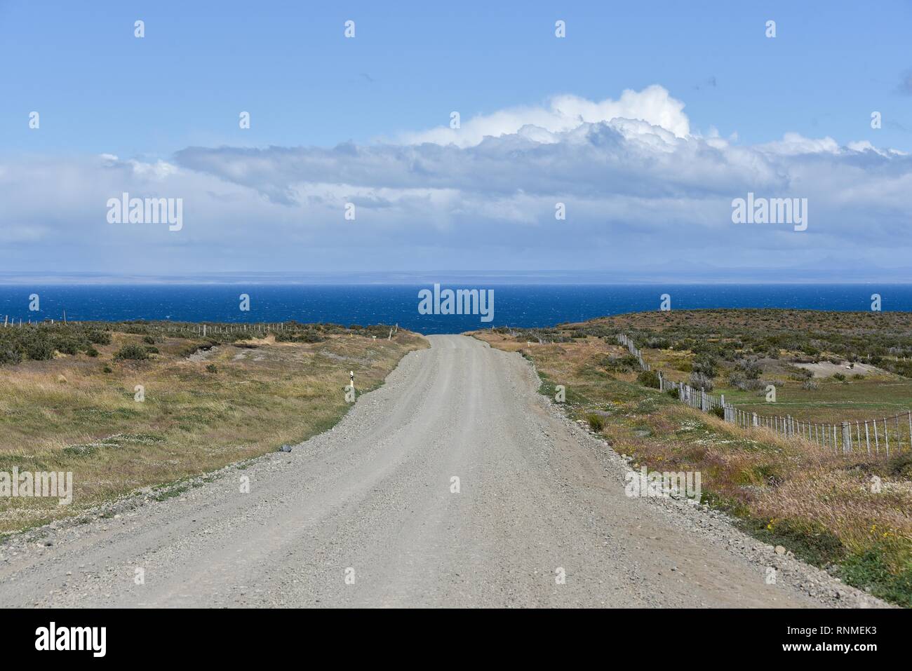 Coastal road in Tierra del Fuego, between Porvinier and Ushuaia, border to Chile, Argentina Stock Photo