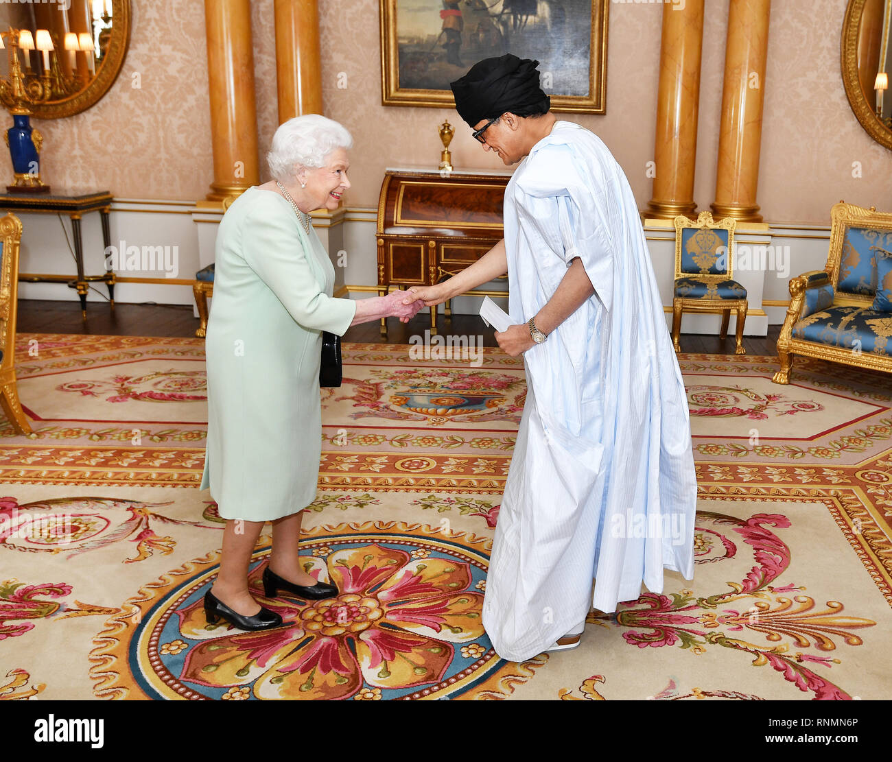 Queen Elizabeth II with Mr Isselkou Izid Bin Neye the Ambassador of  Mauritiania, as he presents his credentials during a private audience at  Buckingham Palace, central London Stock Photo - Alamy