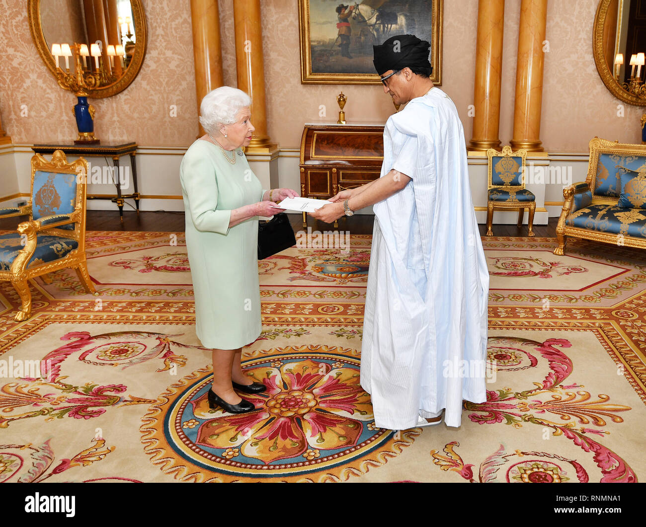 Queen Elizabeth II with Mr Isselkou Izid Bin Neye the Ambassador of  Mauritiania, as he presents his credentials during a private audience at  Buckingham Palace, central London Stock Photo - Alamy