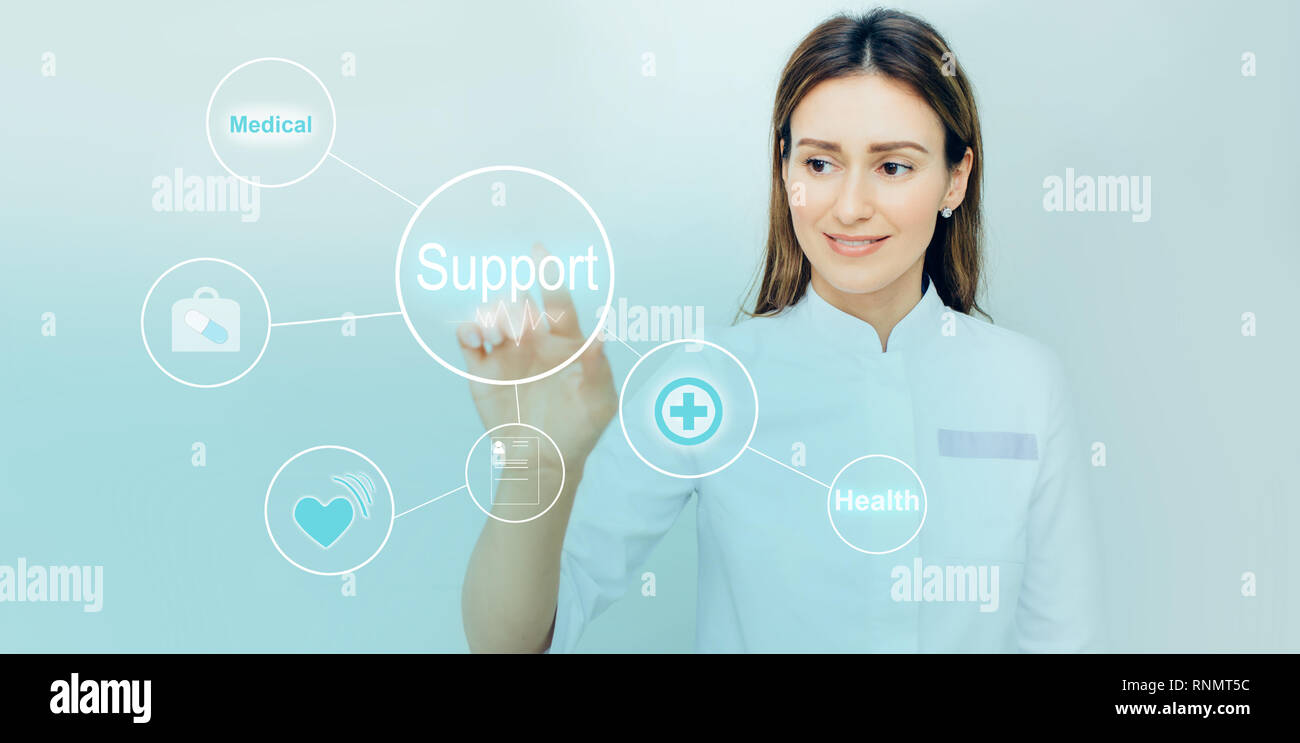 Doctor touching virtual screen with medical icons. concept illustrates future technologies for the medical support Stock Photo