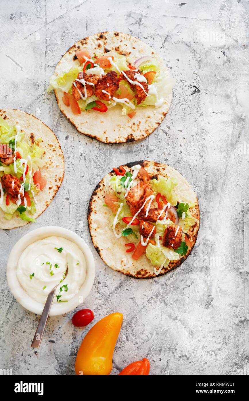 Vegetarian soft tacos served with sour cream dip Stock Photo