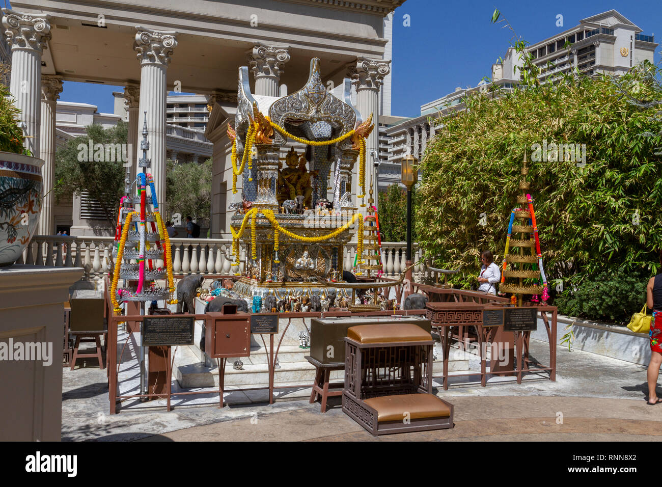 The Shrine Of Four-Faced Brahma in the grounds of the Caesars Palace hotel and casino, on The Strip, Las Vegas, Nevada, United States. Stock Photo