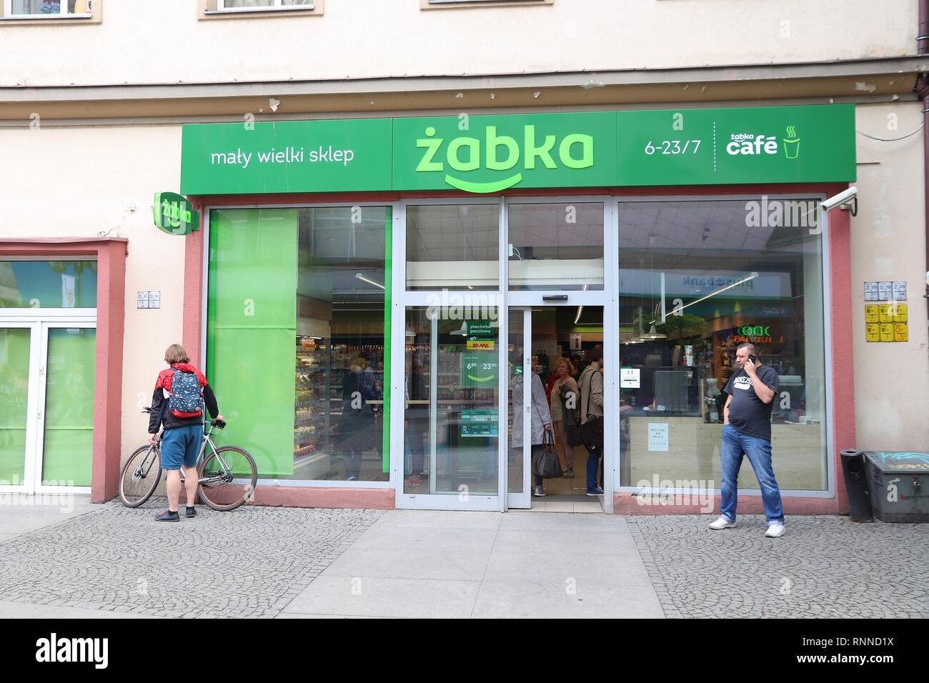 WROCLAW, POLAND - MAY 11, 2018: People visit Zabka convenience store in  Wroclaw, Poland. Zabka is the most recognizable convenience store brand in  Pol Stock Photo - Alamy