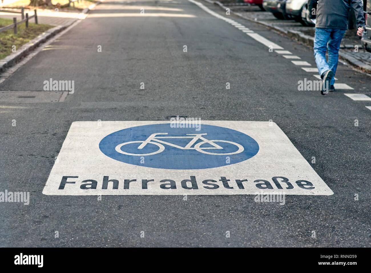 Bicycle road sign on asphalt. Stock Photo