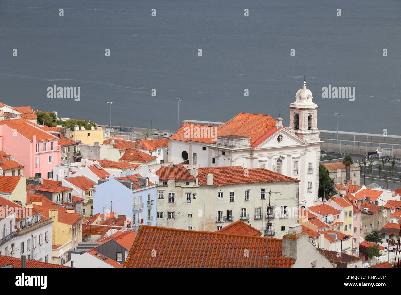 Lisbon cityscape with Santo Estevao Church - Alfama neighborhood. Stock Photo