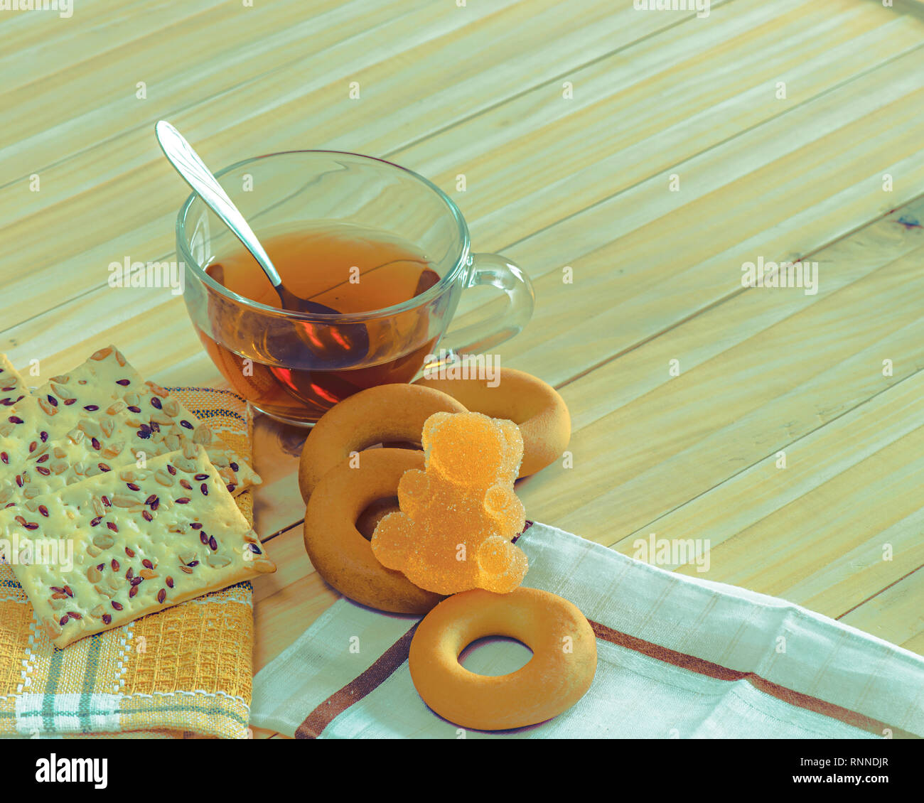 Tea drink in a large bowl and some sweets Stock Photo