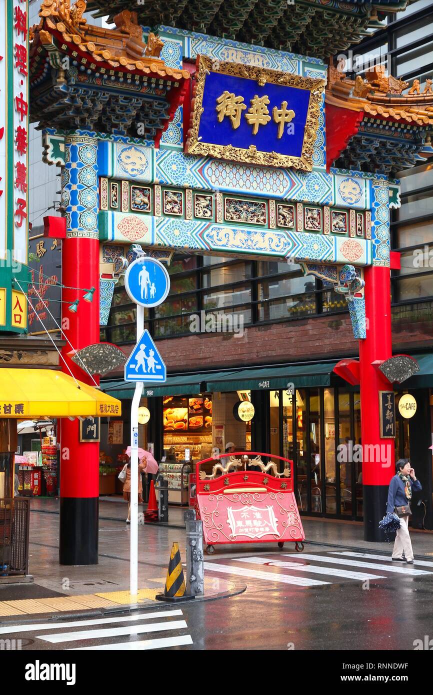 YOKOHAMA, JAPAN - MAY 10: Visitors walk Chinatown on May 10, 2012 in Yokohama, Japan. Yokohama's Chinatown is the largest in Japan and a popular touri Stock Photo