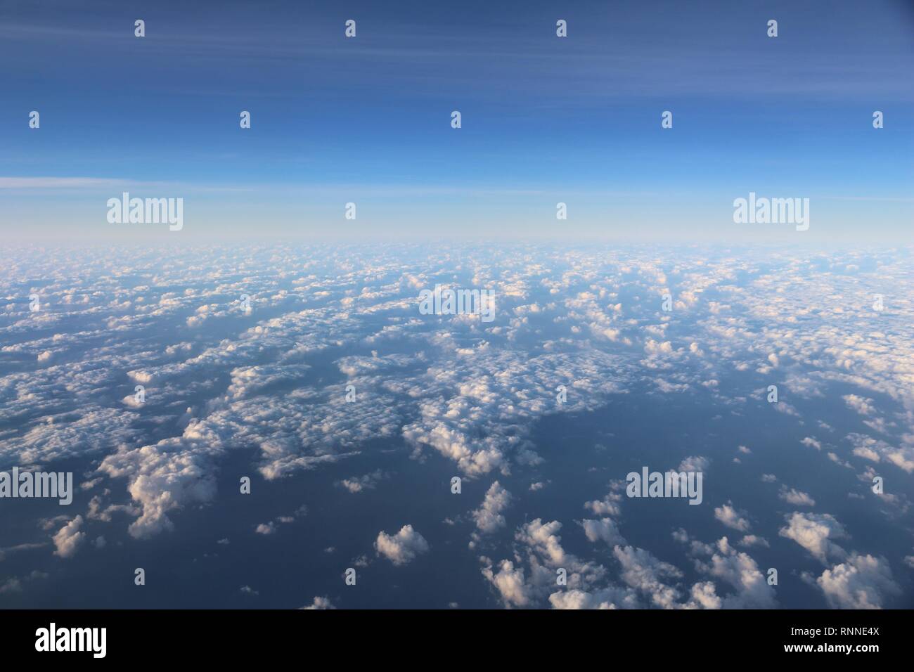 Clouds above the sea. Aerial view. White cumulus clouds sky view from ...